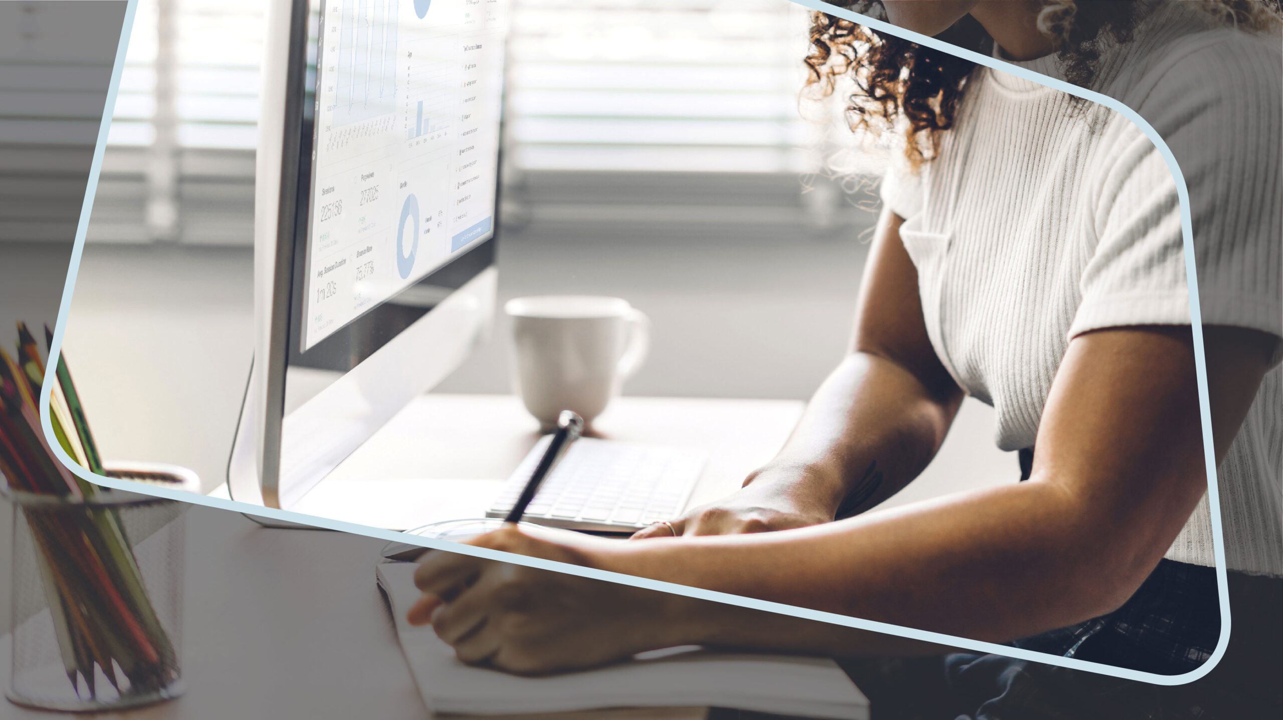 Close up of person working at a desk with rethinking enterprise cms campaign styling added